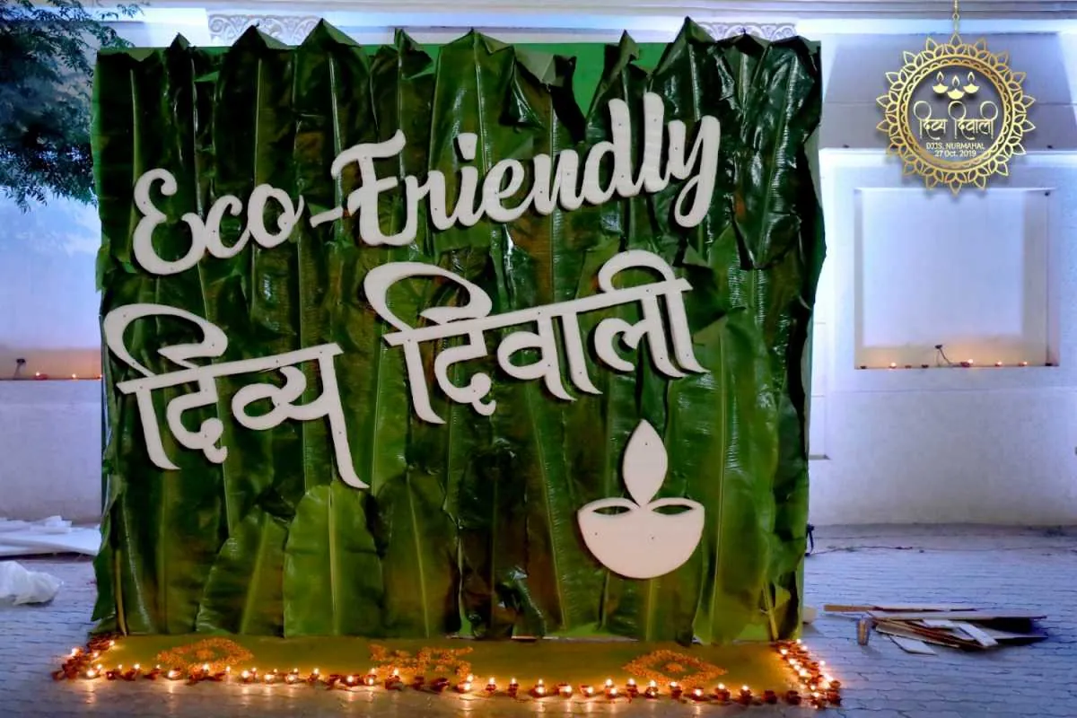 A Divya Diwali sign made of green leaves, part of the eco-friendly decorations at Nurmahal Ashram in 2019